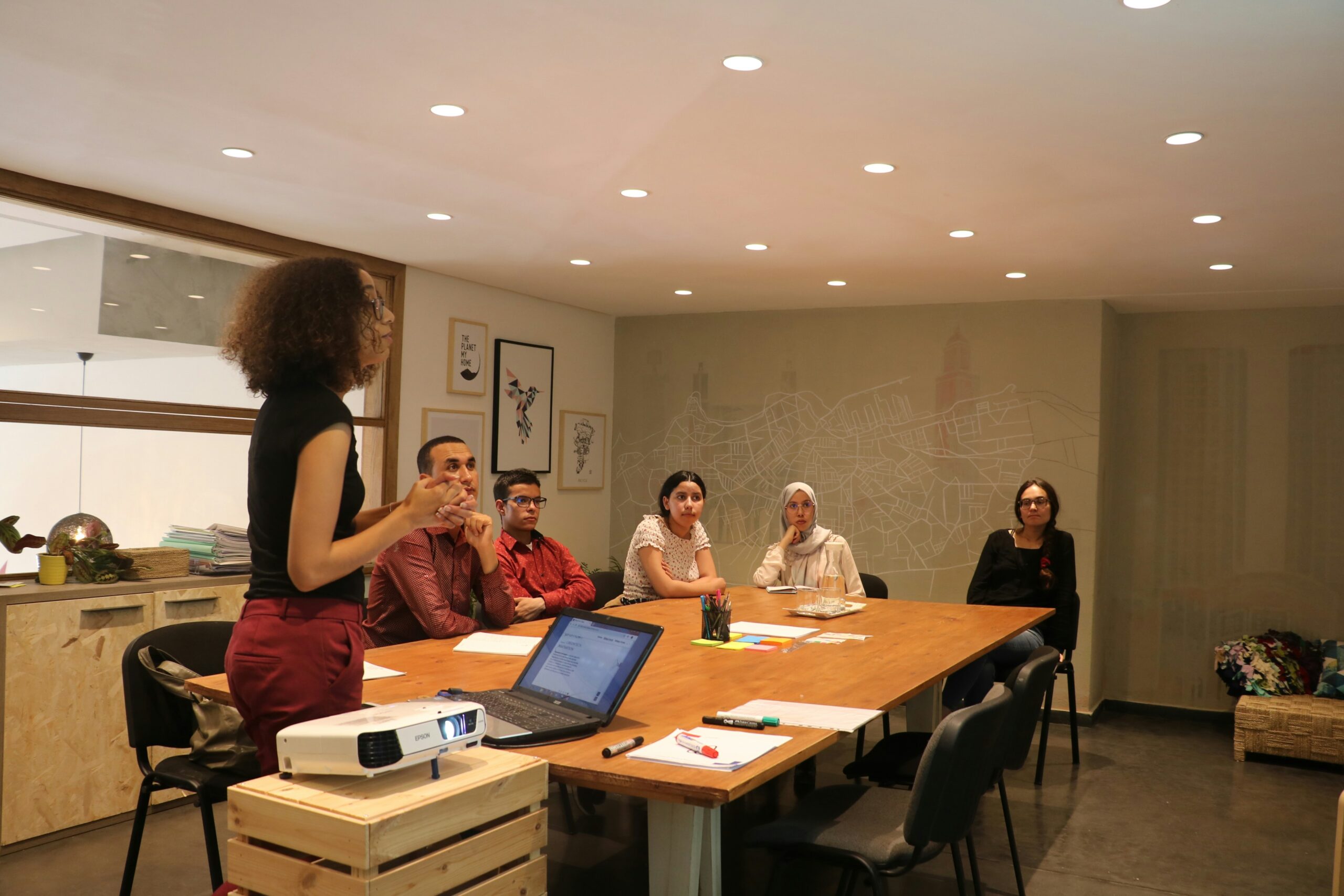 A business development professional presenting in front of people