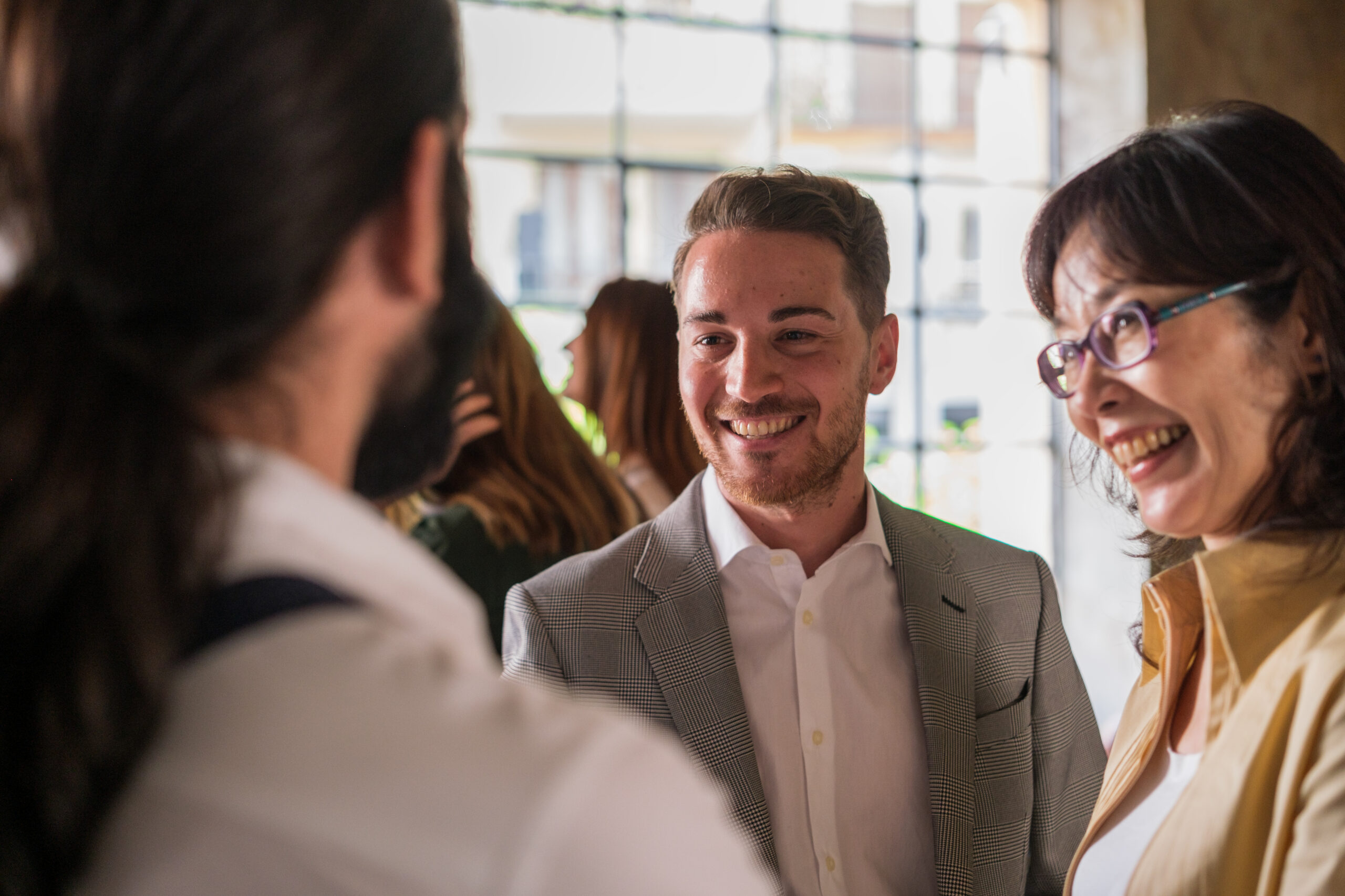 A professional networking with others to improve their customer acquisition strategy